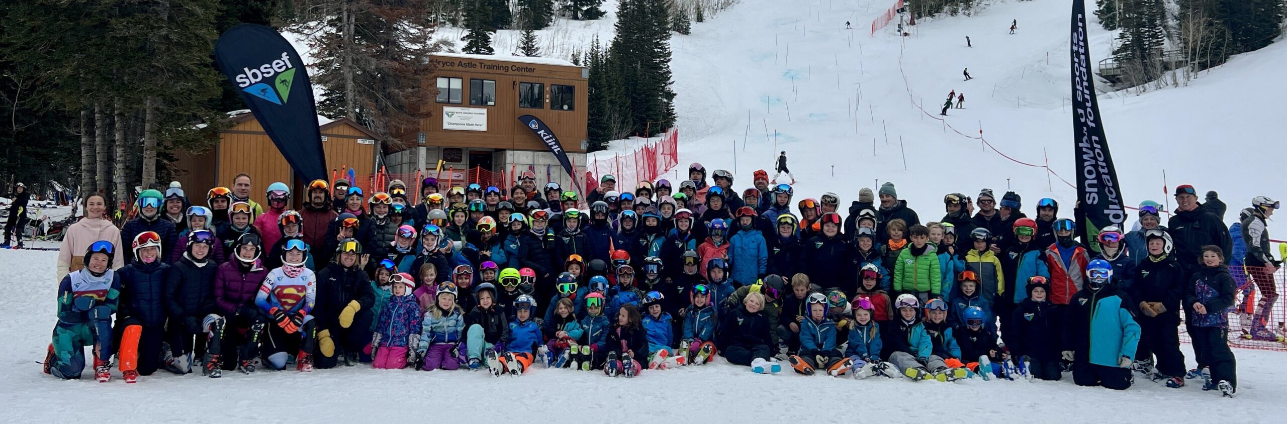 Large group of skiers on snowy slope